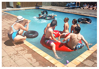 KIDS ENJOYING HOLIDAY CAMP POOL